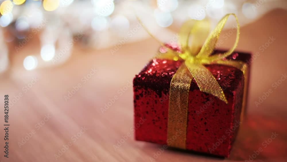 Christmas gift box on the table, selective focus Christmas gift box on the table, selective focus