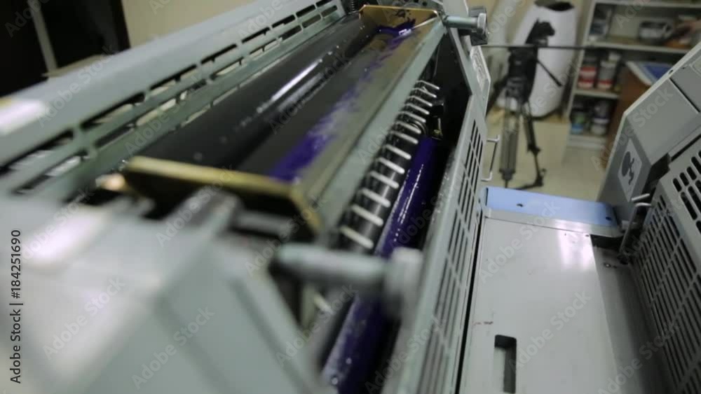 Warehouse in printing. The equipment for a press in a modern printing house Warehouse in printing. The equipment for a press in a modern printing house
