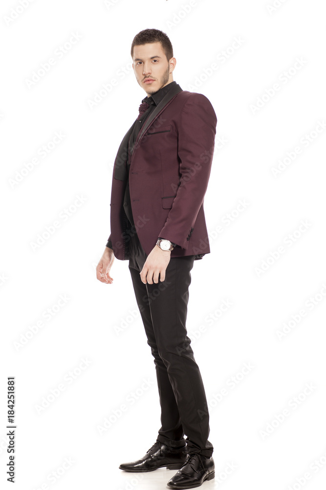young handsome man in a suit on white background young handsome man in a suit on white background