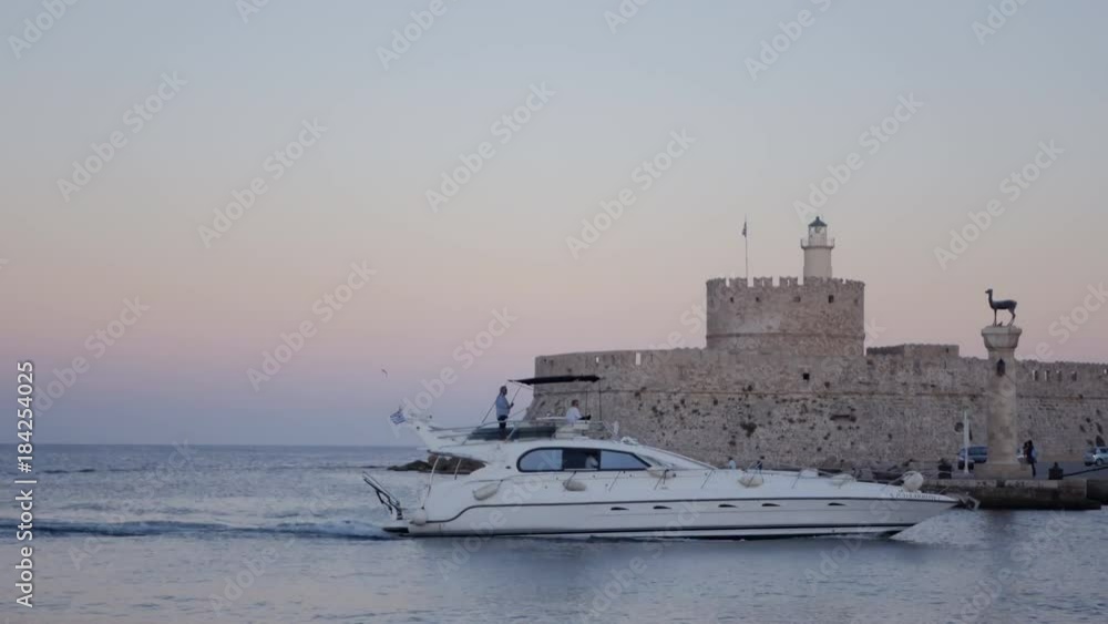 The entrance to the harbor in Rhodes greece The entrance to the harbor in Rhodes greece