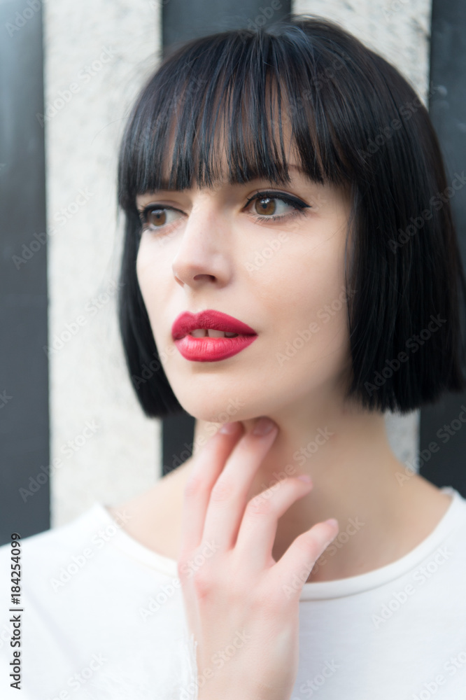 Girl or woman with red lips in paris, france Girl or woman with red lips in paris, france