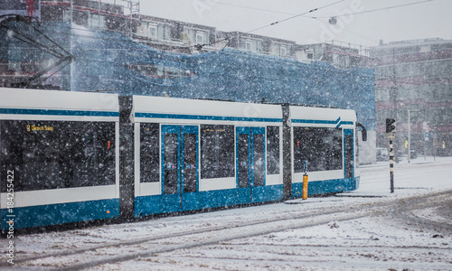 Photography Tram in Amsterdam on snowy day