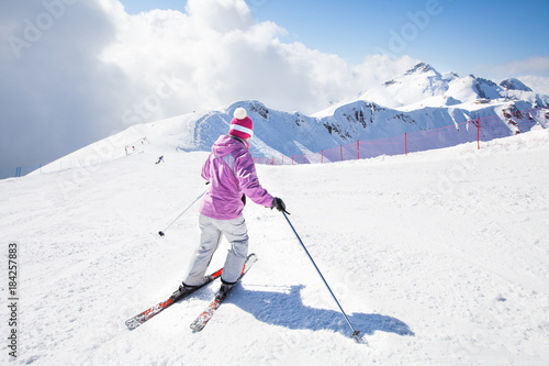 woman skiing in the mountains