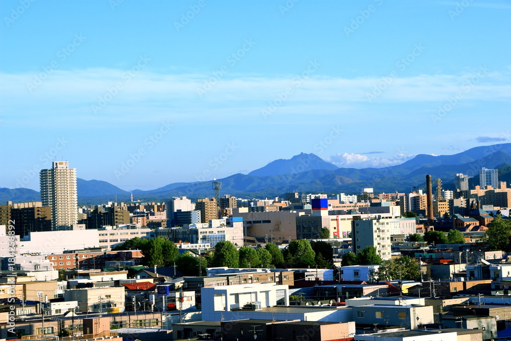 View of mountain ranges from the city of Sapporo