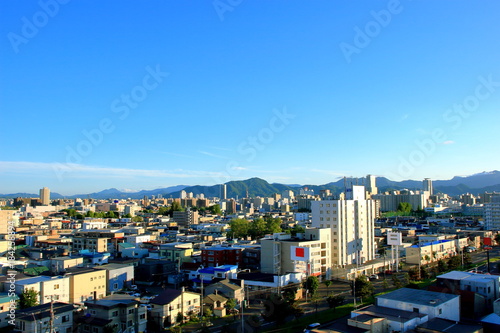 View of mountain ranges from the city of Sapporo