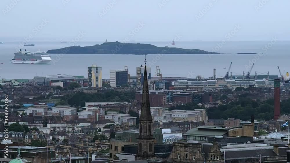 August 2017: Panorama of the port of Edinburgh, Inchkeith Island and a cruise ship ready to moor. August 2017 in Edimburgh August 2017: Panorama of the port of Edinburgh, Inchkeith Island and a cruise ship ready to moor. August 2017 in Edimburgh