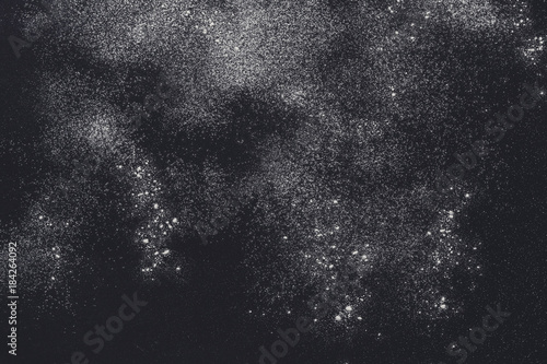 Fotografie, Obraz Baking concept on black background, sprinkled flour with copy space