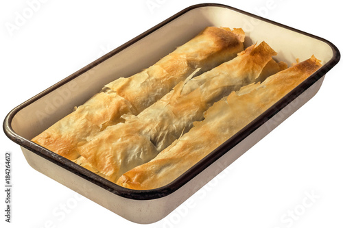 Serbian Traditional Cheese Spinach Pie Rolls In Baking Pan Isolated On White Background photo