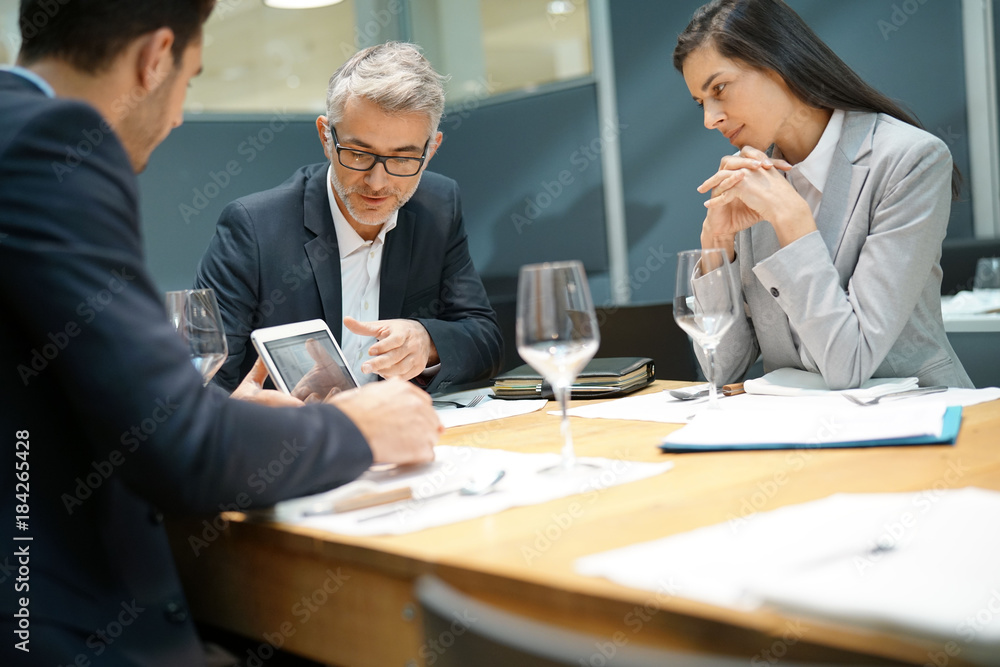 Executive people doing business report presentation in restaurant Executive people doing business report presentation in restaurant