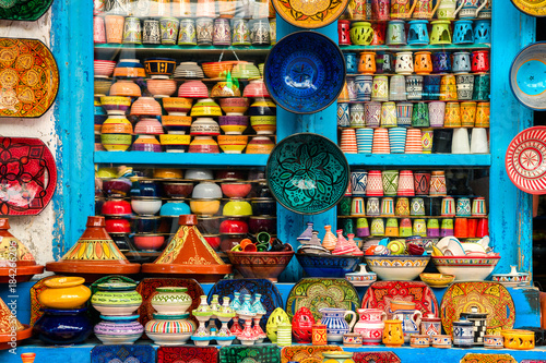 colorful pottery at moroccan shop © jon_chica