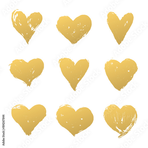 Set of gold grunge hearts.Vector golden heart shapes.