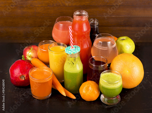 fruit and vegetable juices on a dark background