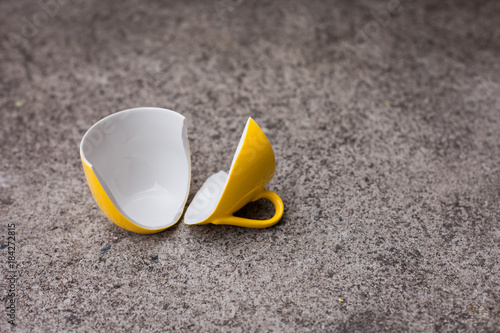 Broken glass of tea Down on the ground.