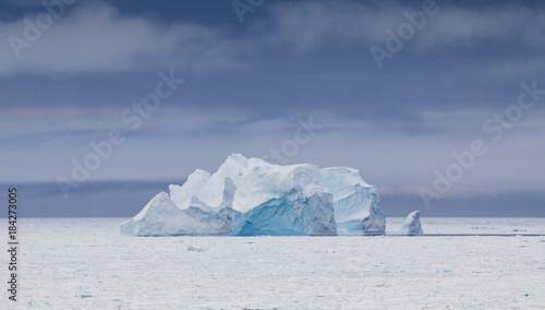 iceberg in deep blue colors © IzzetNoyan