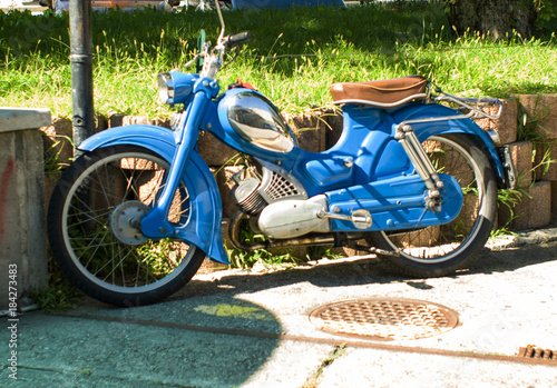vintage motorbike with mirror tank  sky blue color