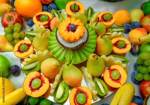 Colorful Fruit mix on the table. Decorated fruit table.