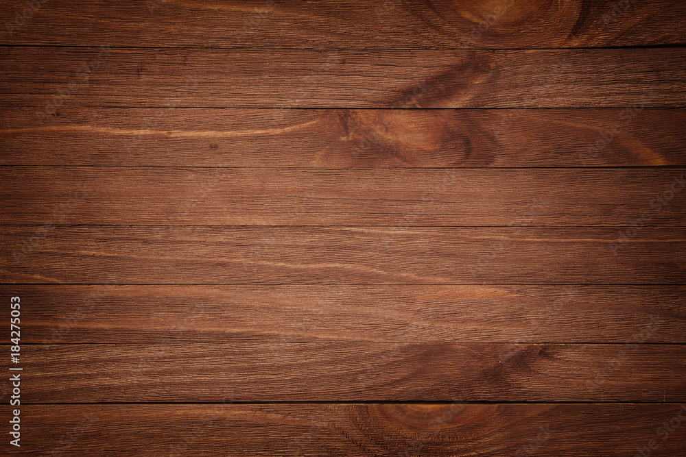 Obraz premium natural background pattern of a old log cabin wood wall. Weathered wooden logs with natural pattern grunge background.