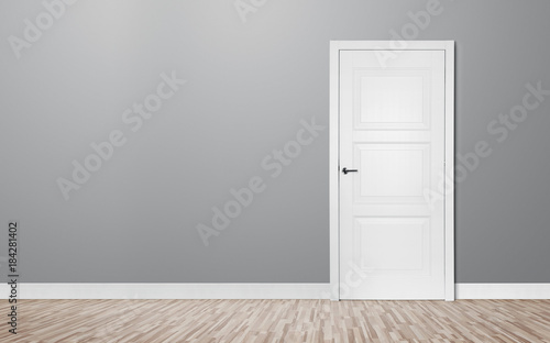 Close up of closed wooden door in the empty room with copy space photo