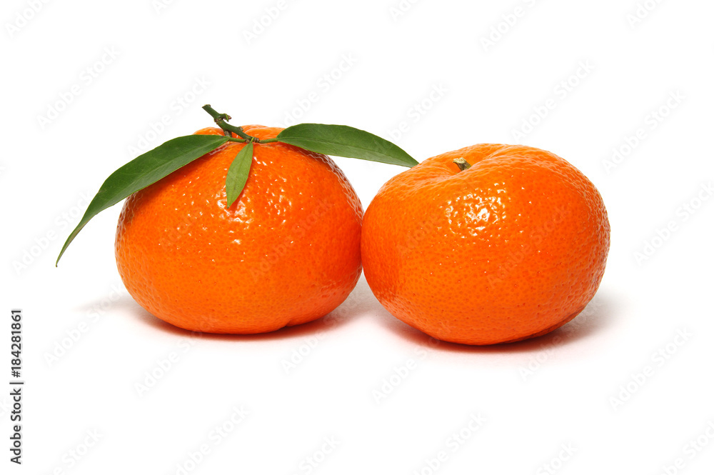 Tangerine or clementine with green leaf Tangerine or clementine with green leaf