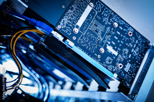 Fototapeta Naklejka Na Ścianę i Meble -  Bitcoin mining device in a close-up shot.