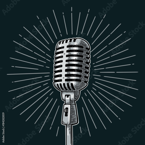 Microphone with ray. Vintage vector black engraving illustration