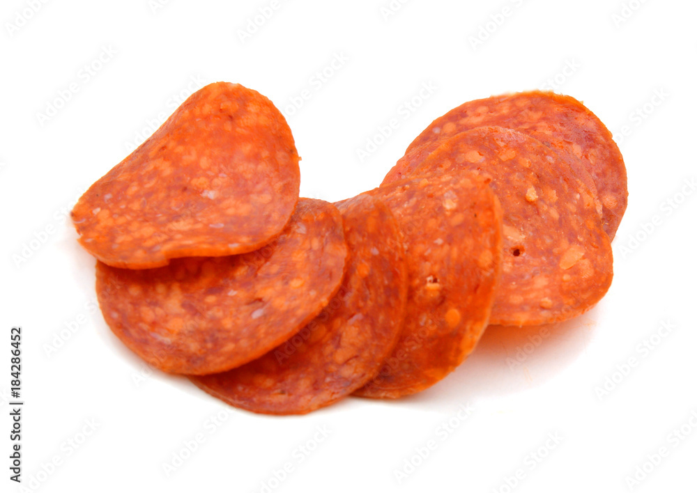 lices of pepperoni on white background lices of pepperoni on white background
