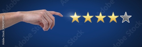 Hand pointing at rating review stars © vectorfusionart