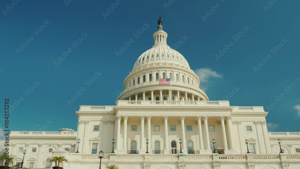 The majestic famous Capitol building in Washington, DC. Against the background of the blue sky. 4K RroRes HQ 10 bit video The majestic famous Capitol building in Washington, DC. Against the background of the blue sky. 4K RroRes HQ 10 bit video