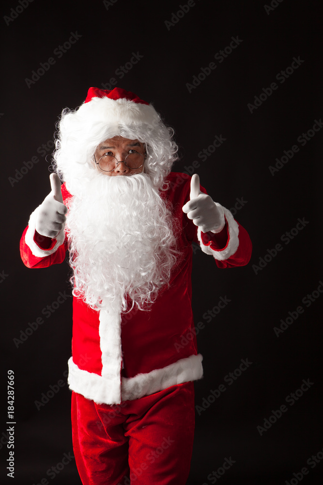 Santa Claus portrait on dark background Santa Claus portrait on dark background