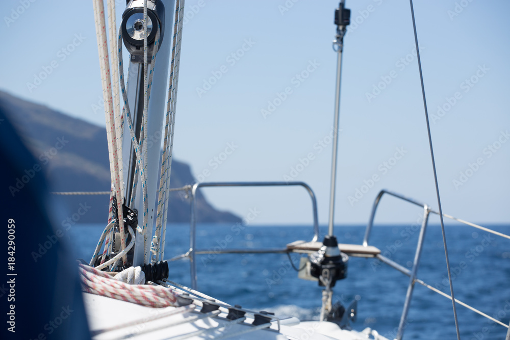 Sailor sailing at atlantic sea infront coast
