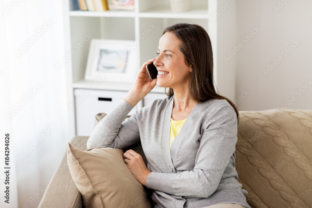 happy woman calling on smartphone at home happy woman calling on smartphone at home