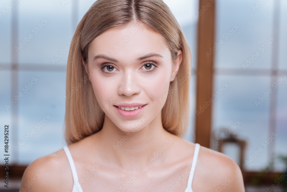 Rure beauty. Portrait of a beautiful young woman smiling and looking at you Rure beauty. Portrait of a beautiful young woman smiling and looking at you