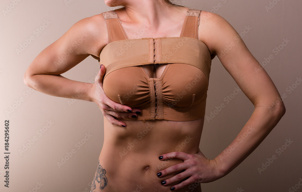 Woman wearing a compressing bra