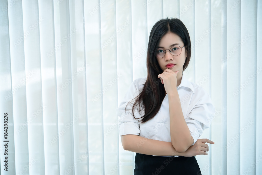 Secretary beautiful girl on the desk in the office of the company. Secretary beautiful girl on the desk in the office of the company.