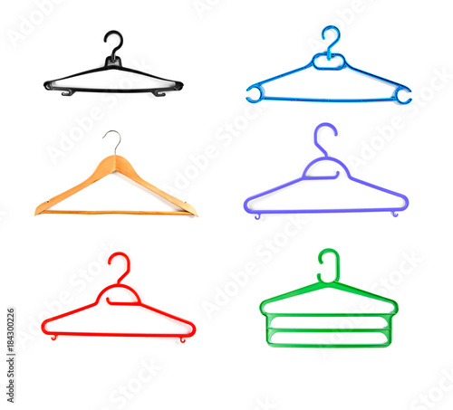 Set of plastic hangers for clothes on a white background.