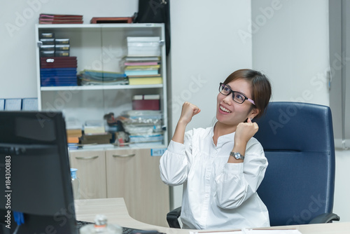 Happy business woman in a office