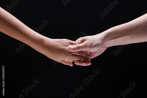 Closeup human hand touch together.