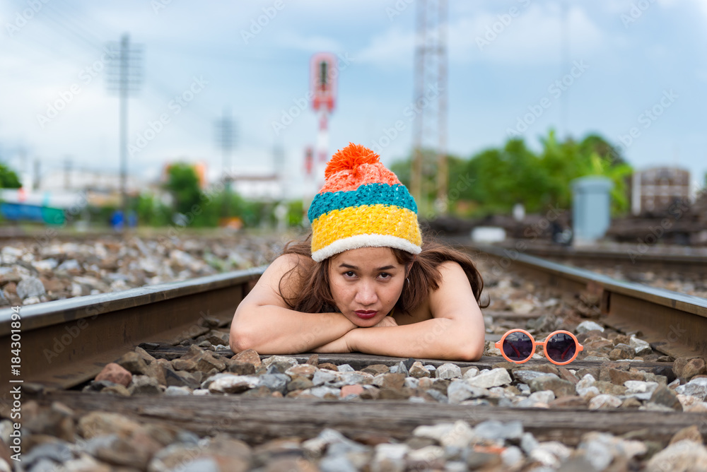 Portrait of Asian hipster girl at railway,thailand people