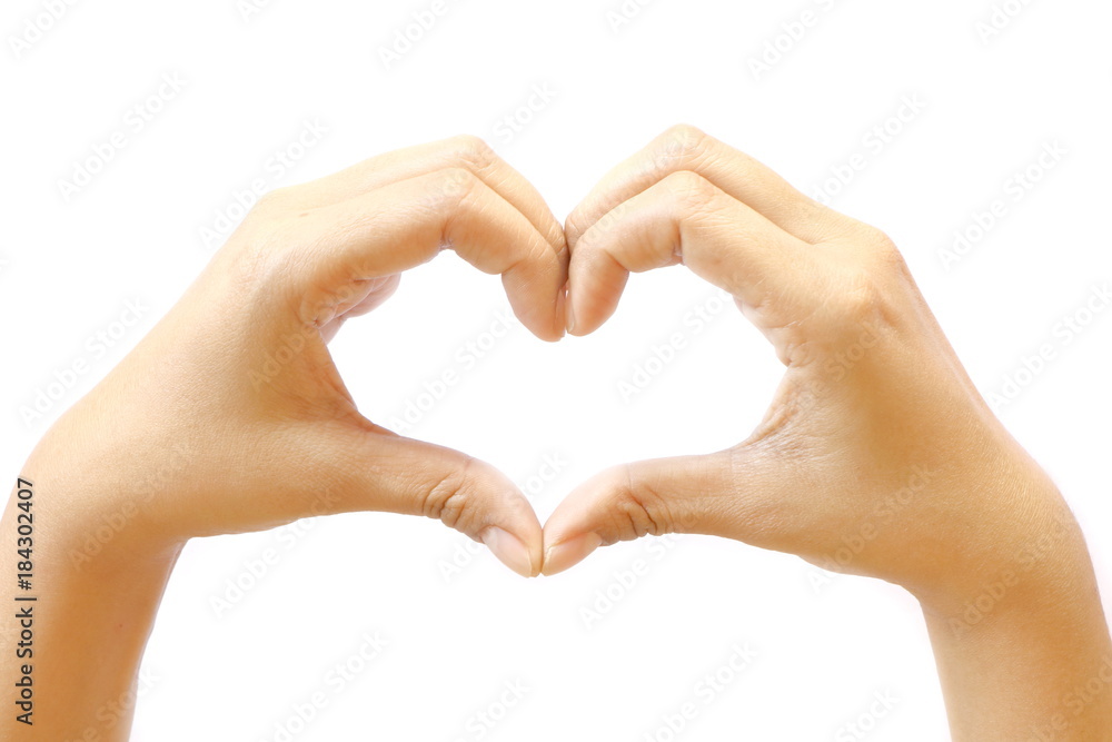Asian woman make her hand like heart shape sign of love on white background Asian woman make her hand like heart shape sign of love on white background