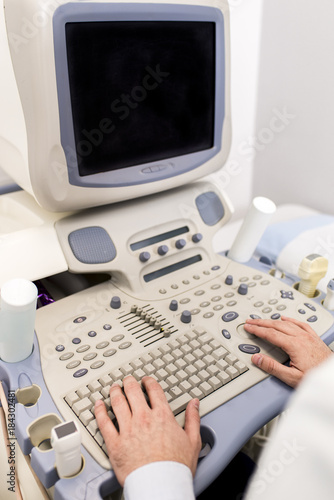 Doctor working on ultrasoun...