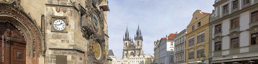 Panoramic view of Astronomical clock (Orloj), and Church of Our Lady before Tyn in Old Town Square , Prague, Czech Republic