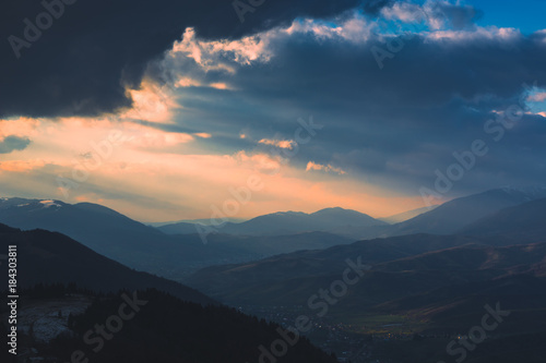Dramatic stormy clouds over the mountain valley © Bashkatov