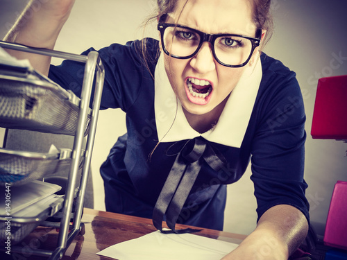 Angry mad bossy businesswoman being furious
