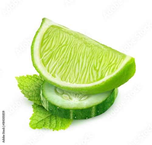 Isolated slices of cucumber and lime, and mint leaf (cocktails component) isolated on white background, with clipping path