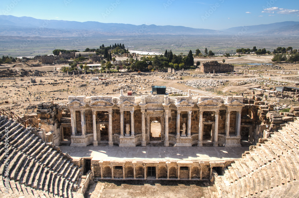 The ruins of the ancient Hierapolis city next to the travertine pools of Pamukkale, Turkey
