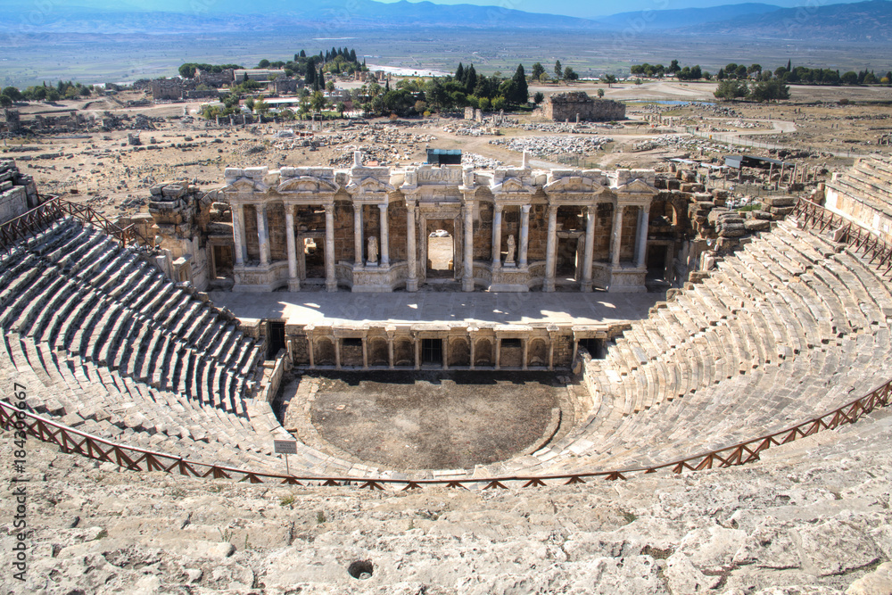 The ruins of the ancient Hierapolis city next to the travertine pools of Pamukkale, Turkey
