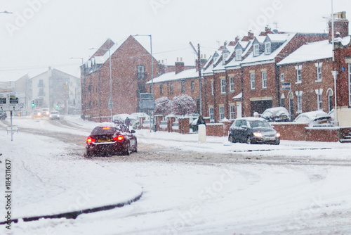 cars sliding in snow in the UK 