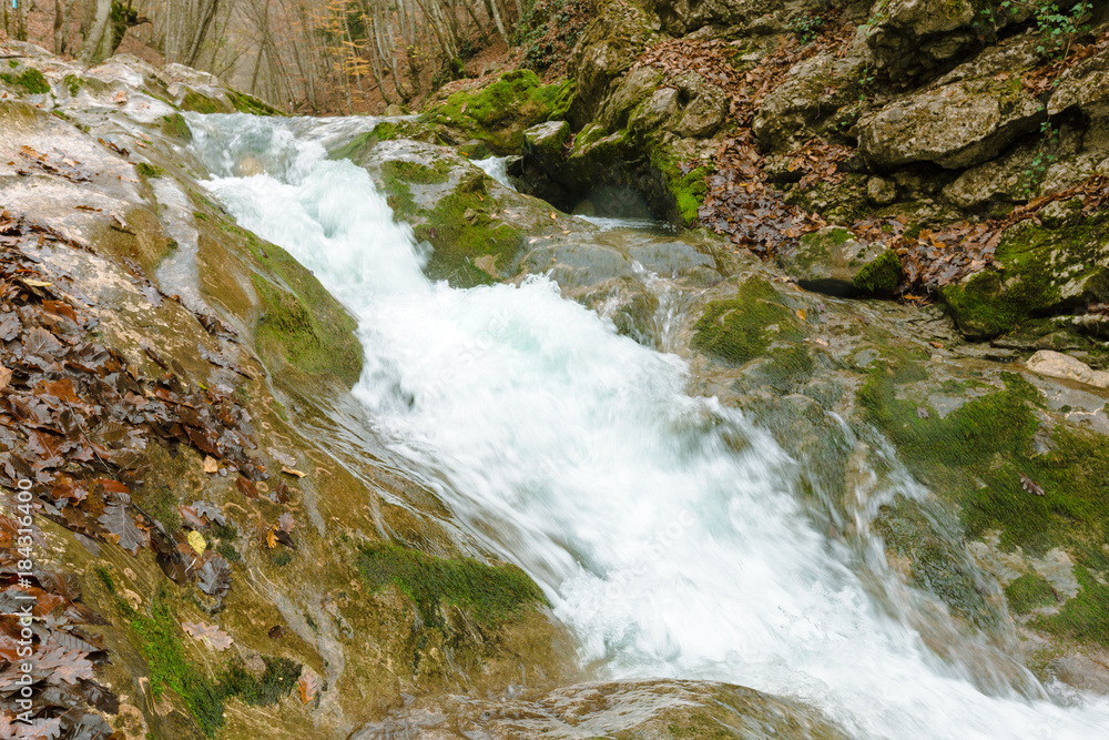 Naklejka premium River in the mountains background