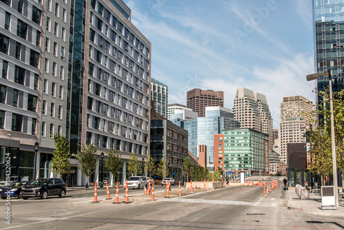Boston MA USA skyline summer day panoramic view buildings downtown and road with traffic at waterfront side