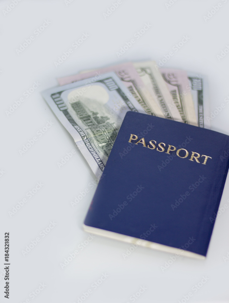 Dollars in blue passport on white background Dollars in blue passport on white background